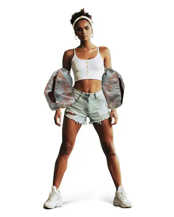 Athletic figure wearing a white crop top, distressed denim shorts, and a camouflage jacket.